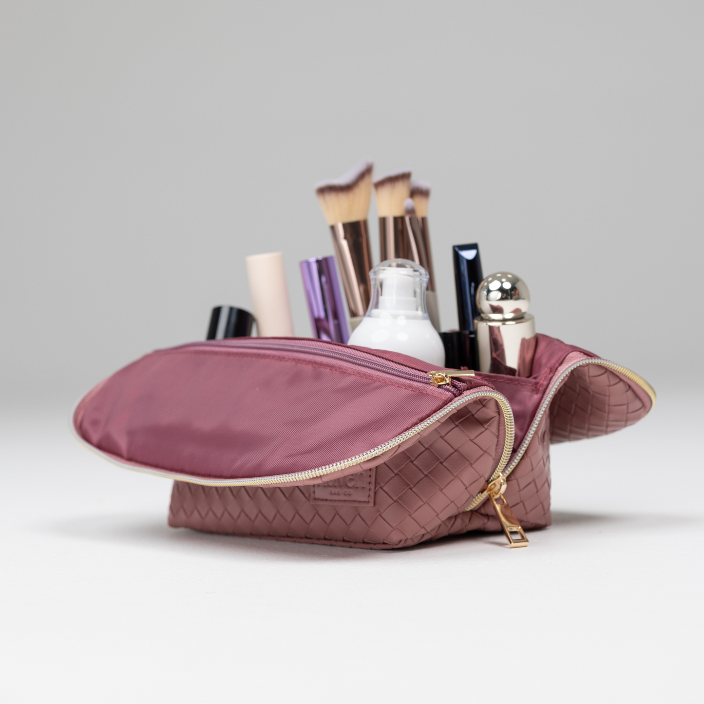 The Mini Beauty Bag in Berry